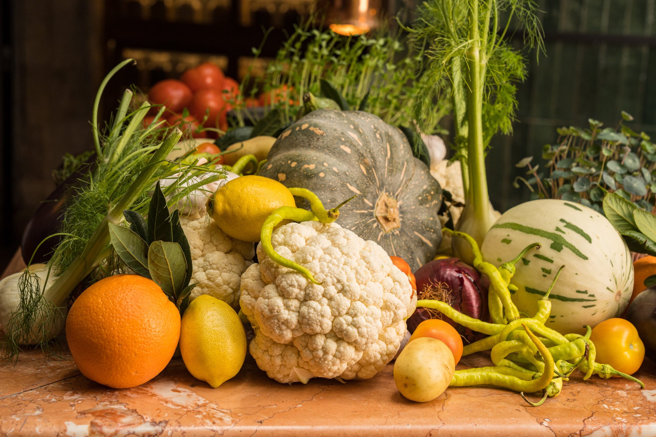 A vibrant Middle Eastern feast at Shaffa, featuring oysters, mezze, and fresh cocktails, served on a green-tiled table in Surry Hills.
